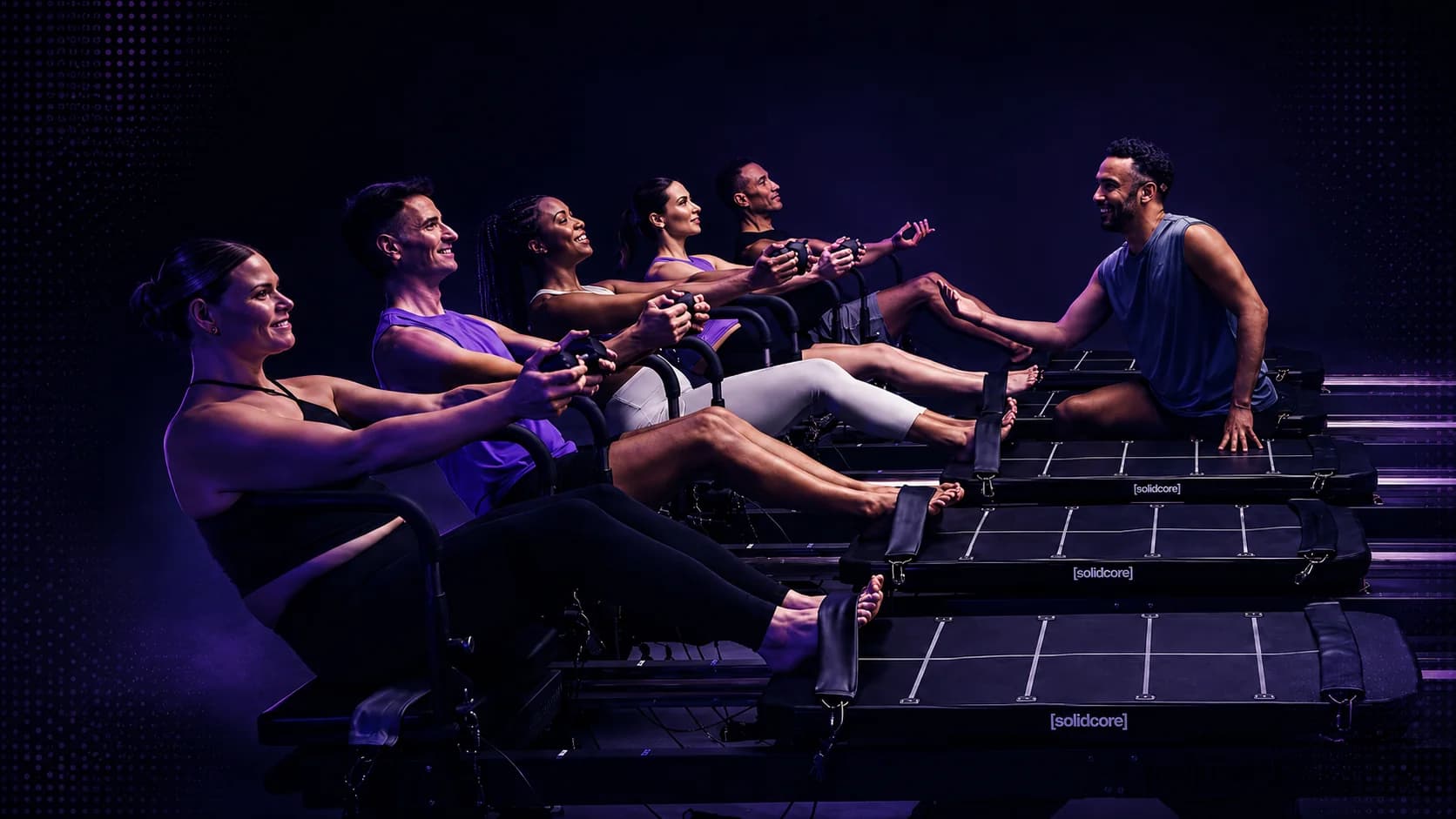 Solidcore Pilates class on reformers